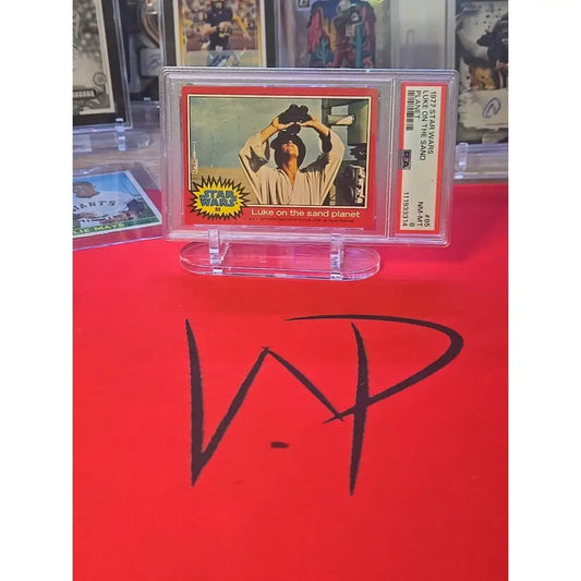 Graded 1977 Star Wars ’Luke on the Sand Planet’ trading card.