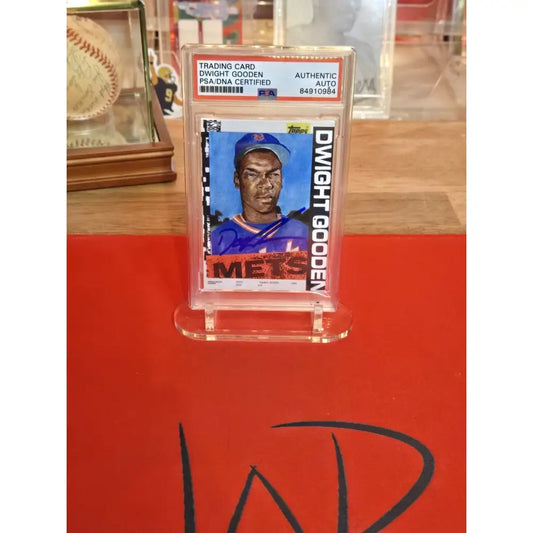 A PSA-graded Dwight Gooden baseball trading card with an authentic autograph.