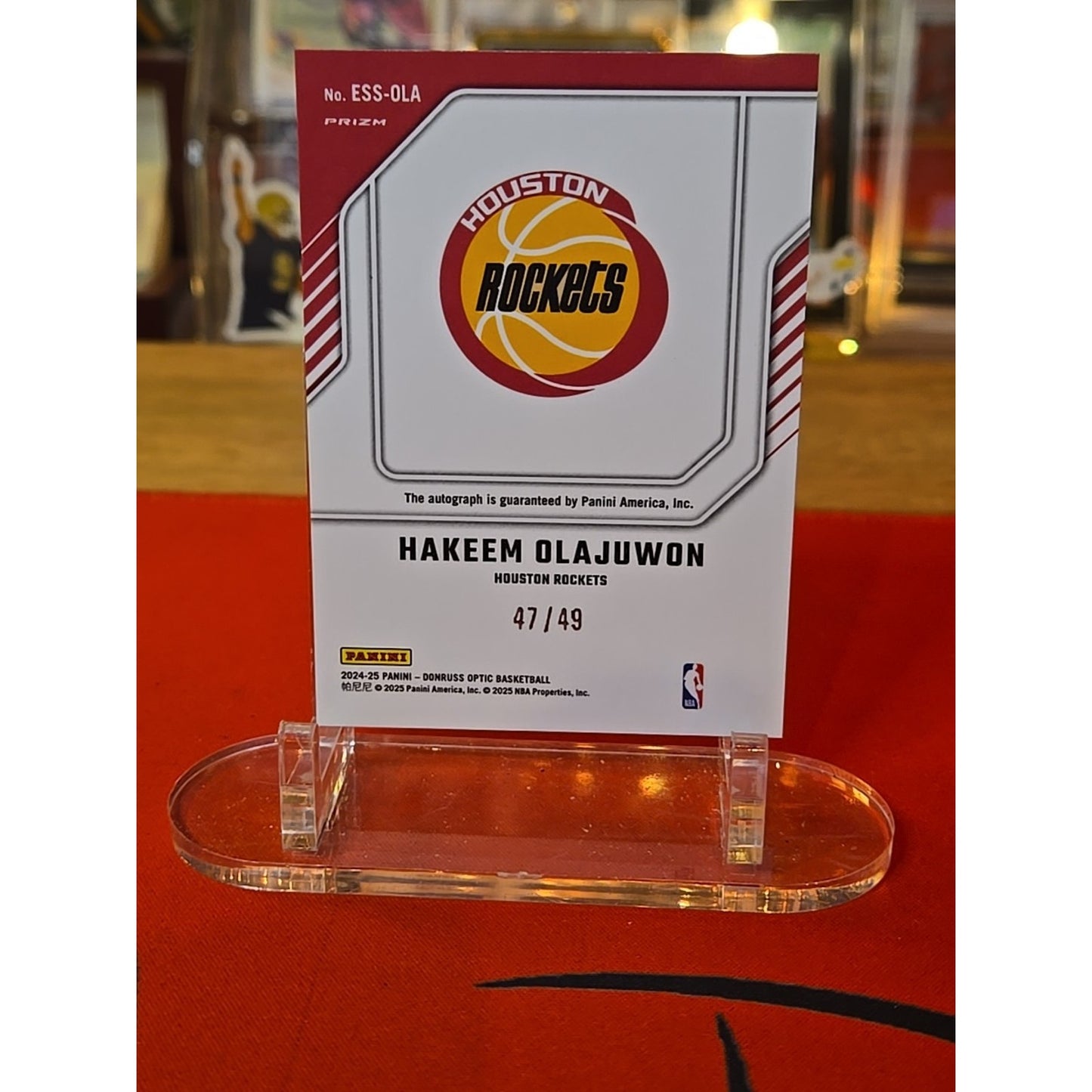 Hakeem Olajuwon /49 Auto 2024-25 Donruss Optic The Elite Series Holo