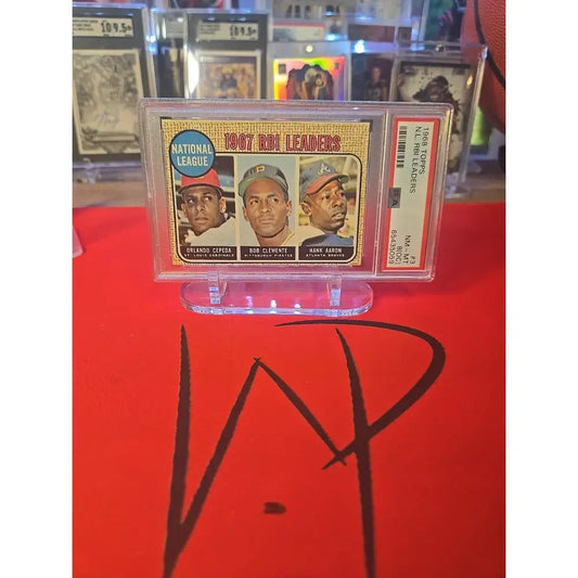 Graded 1967 Topps National League RBI Leaders baseball card featuring Orlando Cepeda, Roberto Clemente, and Hank Aaron.