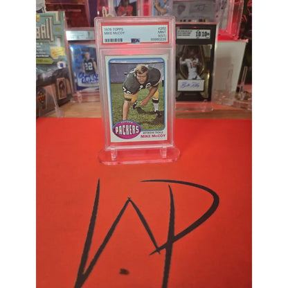 Graded 1970 Topps Mike McCoy football card.