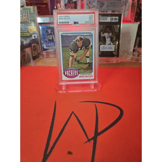 Graded 1970 Topps Mike McCoy football card.