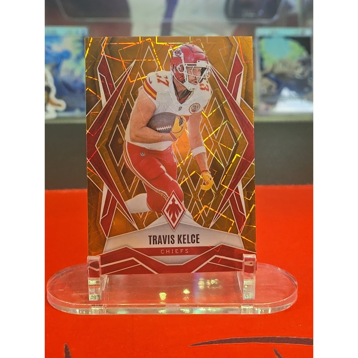 Travis Kelce /35 Orange Lazer 2025 Panini Phoenix