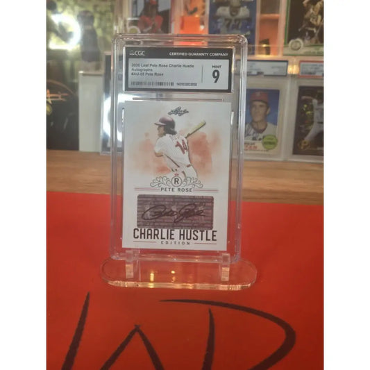 Graded Pete Rose ’Charlie Hustle’ autographed baseball card.
