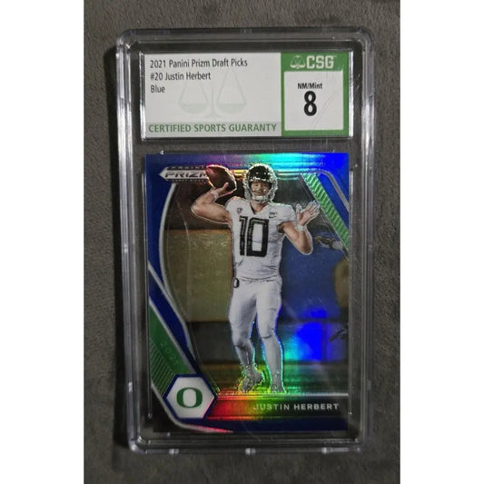 Graded 2021 Panini Prizm Draft Picks #20 Justin Herbert Blue football card, graded NM/Mint 8 by CSG.