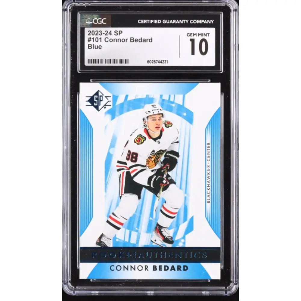 A graded 2023-24 SP #101 Connor Bedard Blue hockey card with a Gem Mint 10 rating.