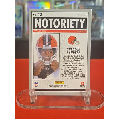 2025 Panini Mosaic - Notoriety Shedeur Sanders #13 Orange Fluorescent Mosaic...