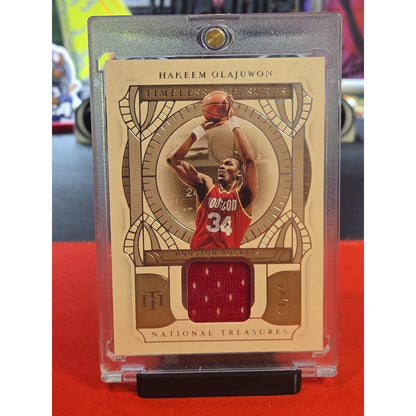 Hakeem Olajuwon /99 Game Worn 2021 Nat. Treasures Timeless Treasures