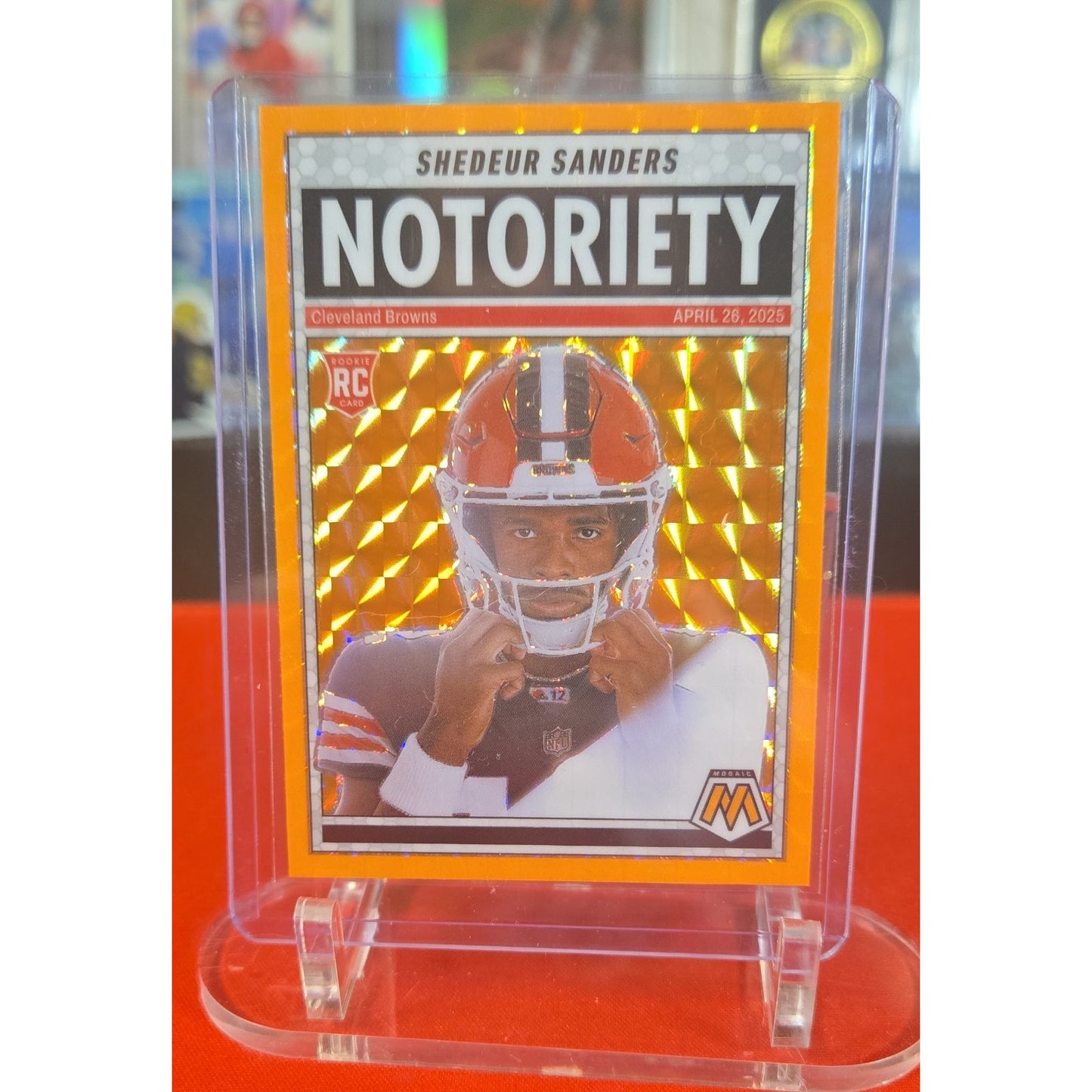 2025 Panini Mosaic - Notoriety Shedeur Sanders #13 Orange Fluorescent Mosaic...