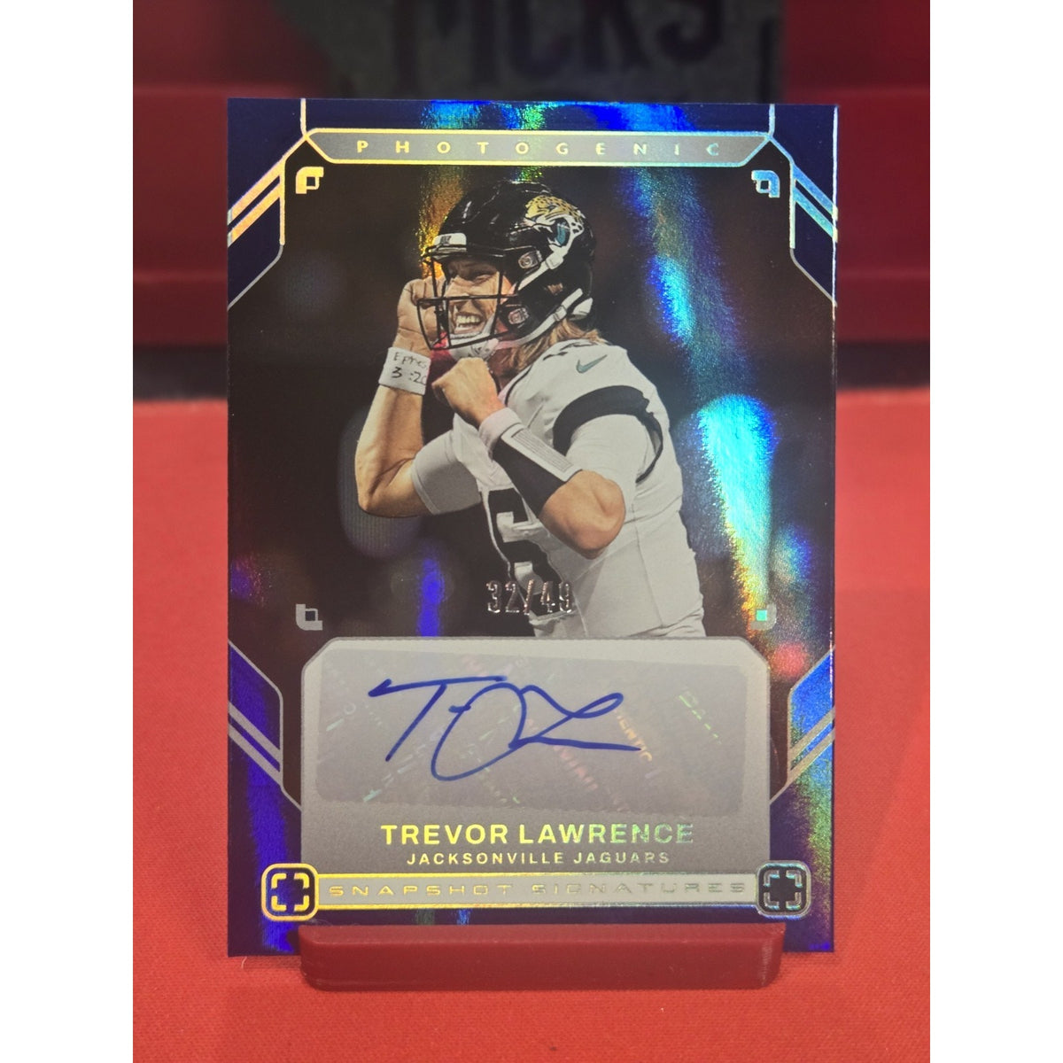Trevor Lawrence /49 Auto 2025 Panini Photogenic - Snapshots Signatures Blue