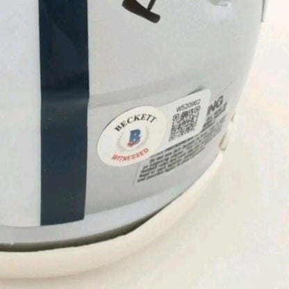 White helmet with a dark blue stripe, featuring a circular Beckett Witnessed sticker with a QR code.