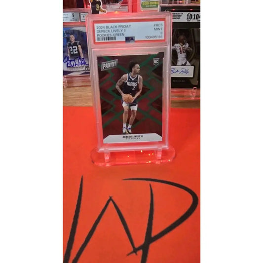 Graded 2024 Panini Black Friday Derek Lively II Rookies Green basketball card.