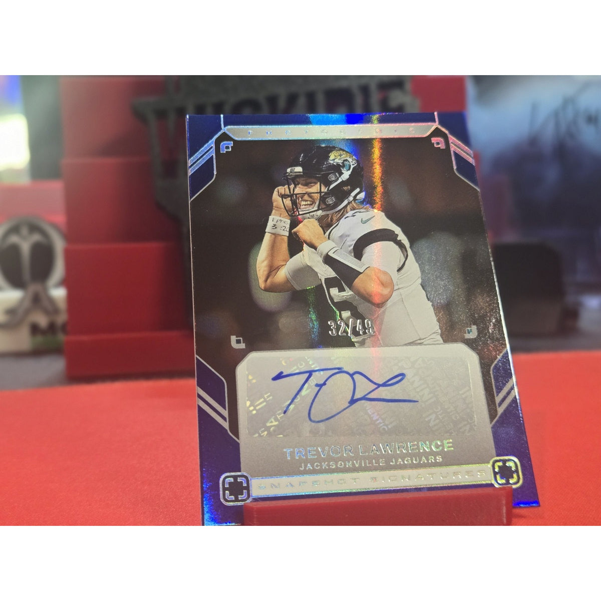 Trevor Lawrence /49 Auto 2025 Panini Photogenic - Snapshots Signatures Blue
