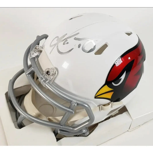 White football helmet with a red and black cardinal logo and a silver facemask.