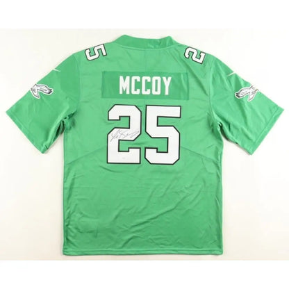 Green football jersey with ’MCCOY’ and ’25’’ on the back.