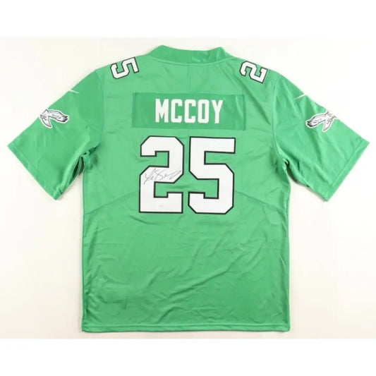 Green football jersey with ’MCCOY’ and ’25’’ on the back.