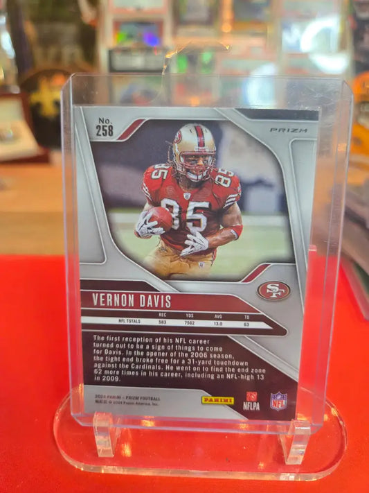 Football trading card of Vernon Davis in a clear protective case.